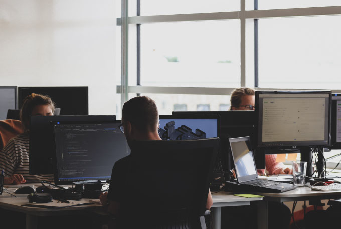 A team of creatives using computers.